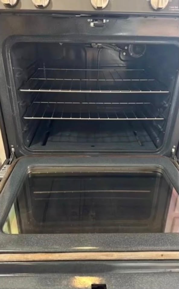 The same oven interior fully degreased with clean racks after deep cleaning